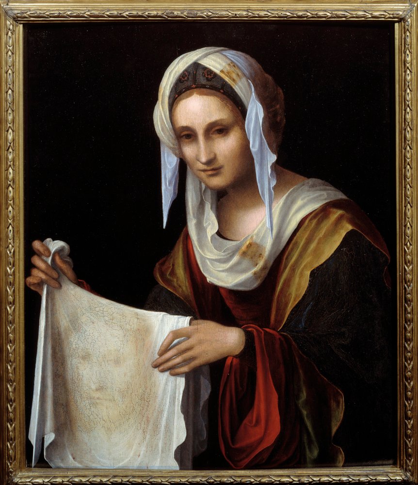 Sainte Véronique. Le Saint Voile représente le visage du Christ, dont Véronique aurait essuyé la sueur lors de la montée au Calvaire. Peinture de Lorenzo Costa (1460-1535). Dimensions : 0,64 x 0,54 m. - Lorenzo Costa