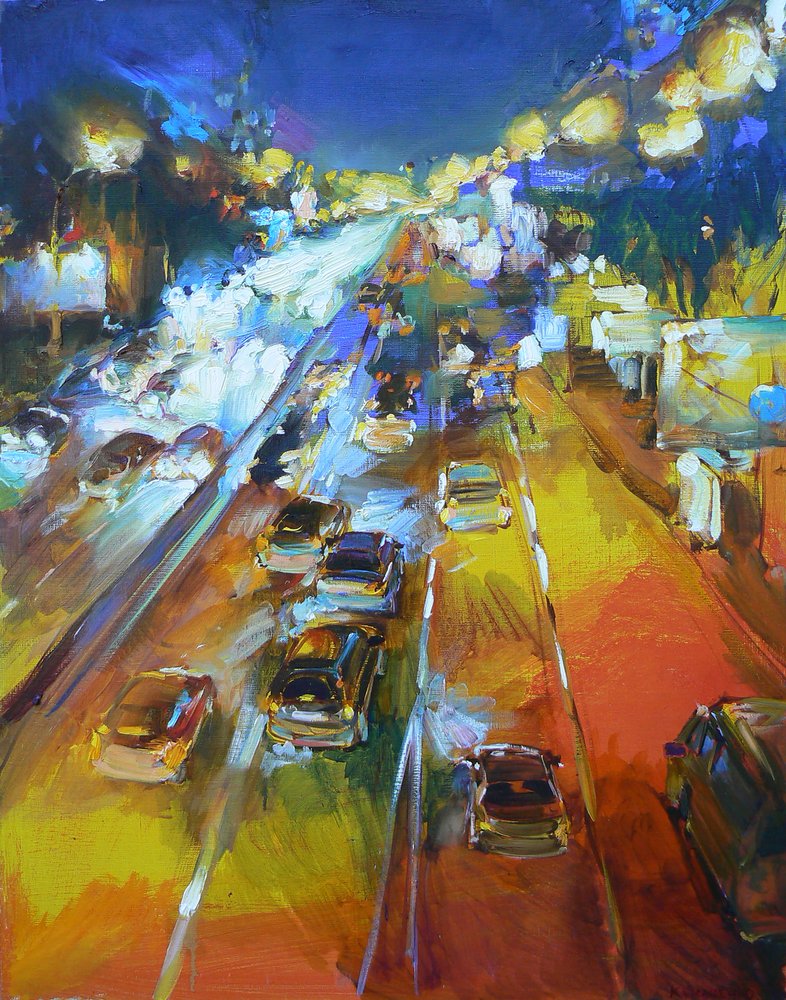 Une autoroute nocturne animée en ville - Andrii Kutsachenko