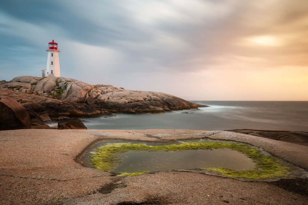 Coucher de soleil sur un phare côtier - Christoph Schaarschmidt