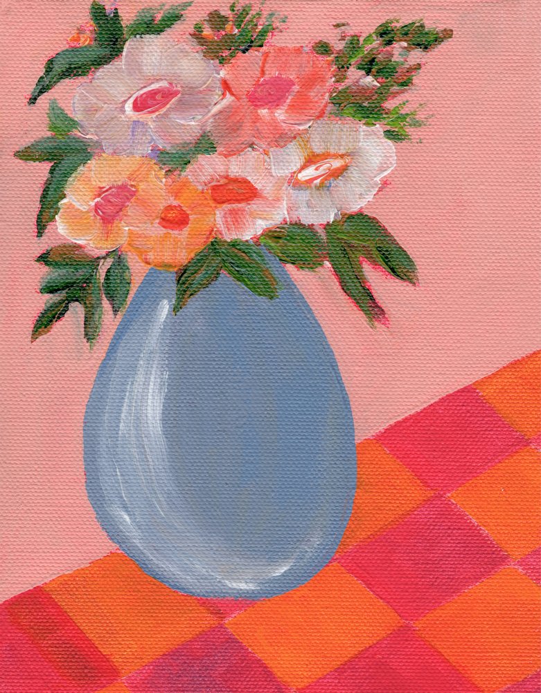 Des fleurs colorées dans un vase bleu - Nikita Jariwala