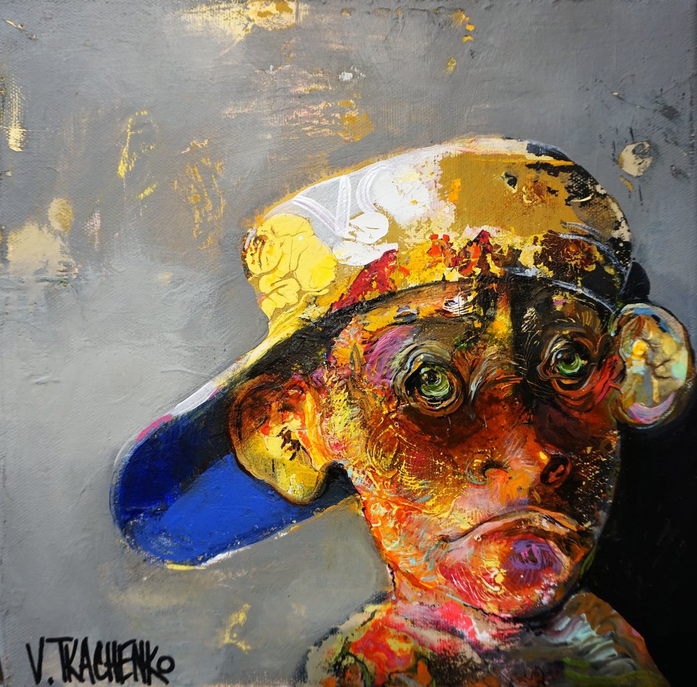 Singe coloré portant une casquette - Victor Tkachenko