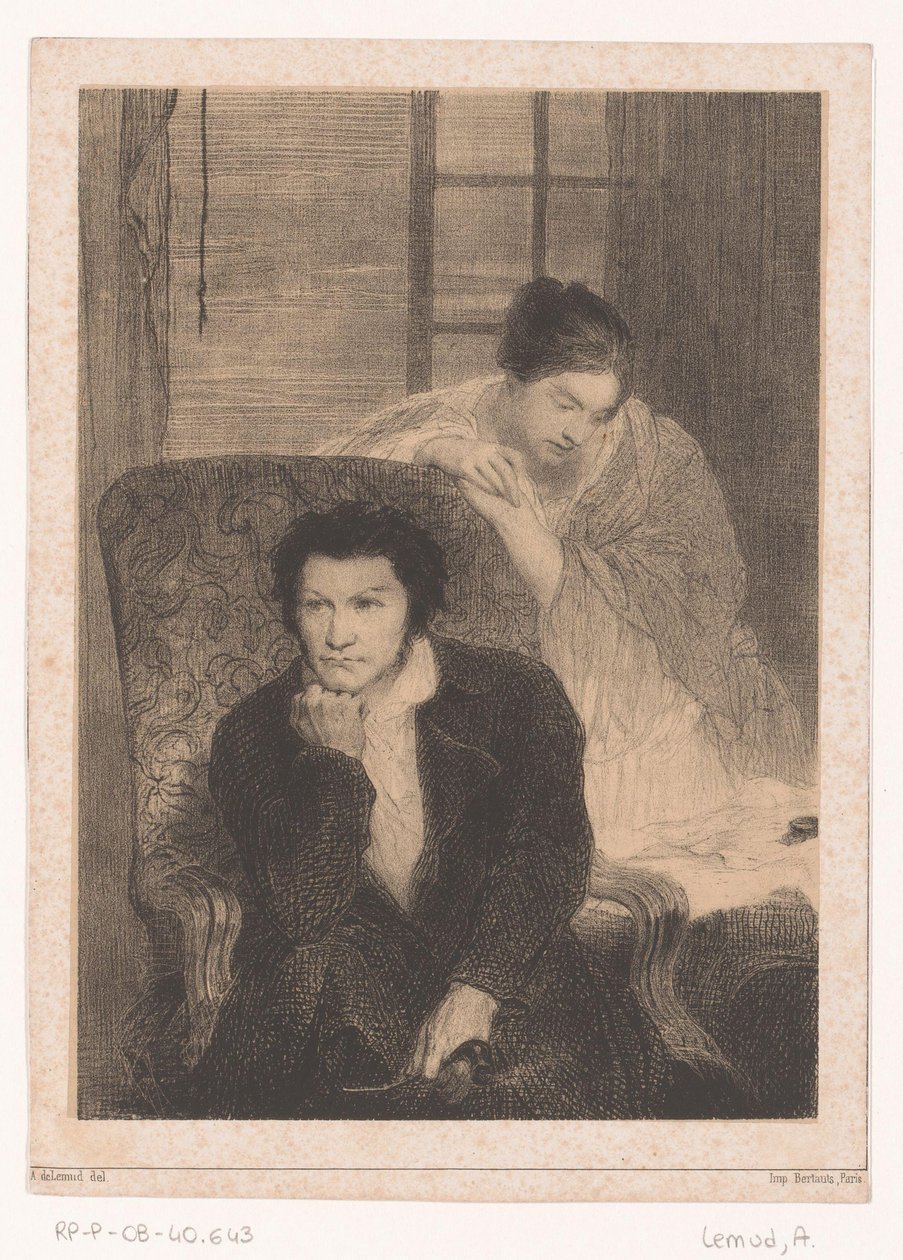 Homme dans un fauteuil avec femme près d