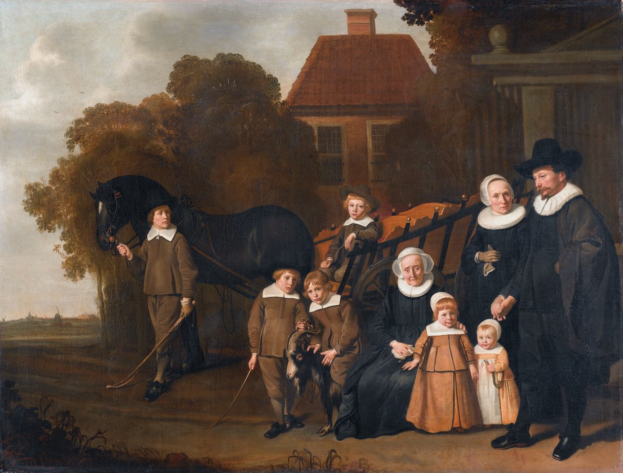 Portrait de la famille Meebeeck Cruywagen près de la porte de leur maison de campagne sur l