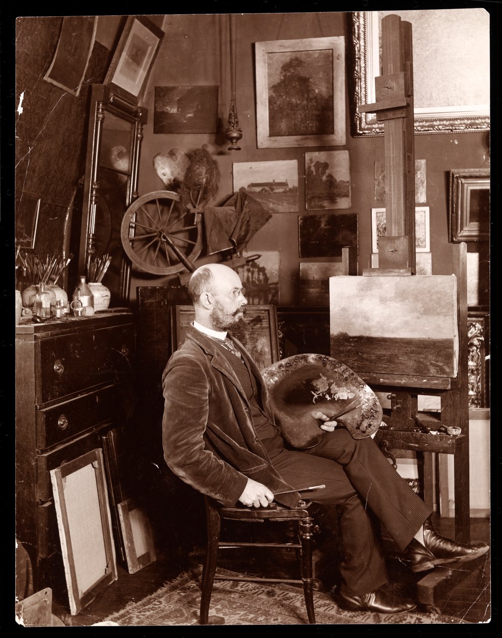 John Francis Murphy dans son studio à The Chelsea, West 23rd Street, New York, c.1895 - Byron Company