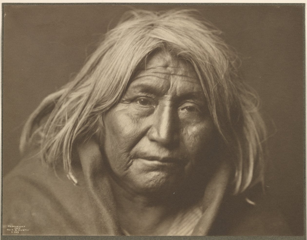 [Un Apache] - Edward S. Curtis