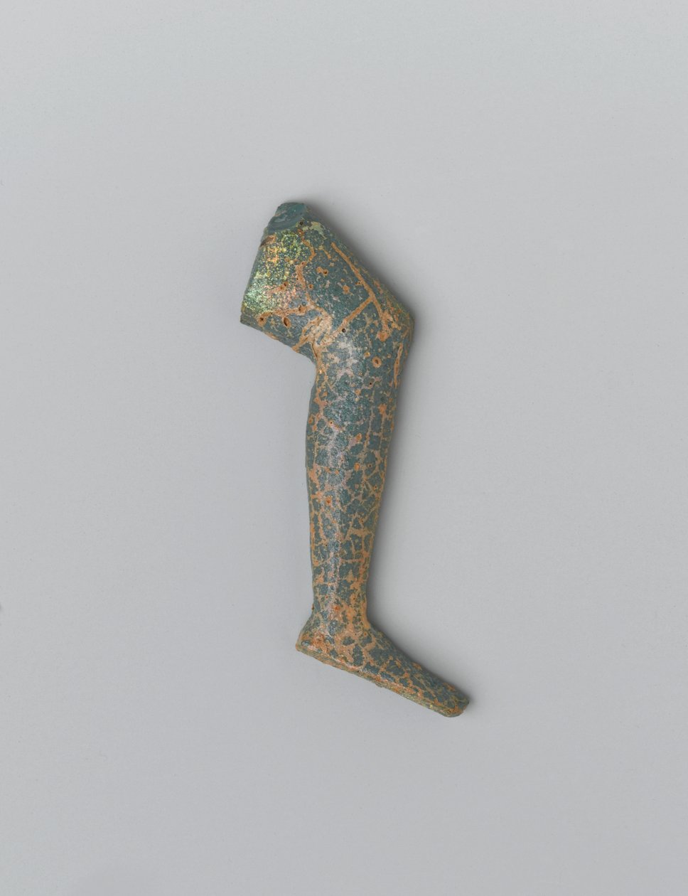 Petite jambe humaine en verre opaque bleu-vert d
