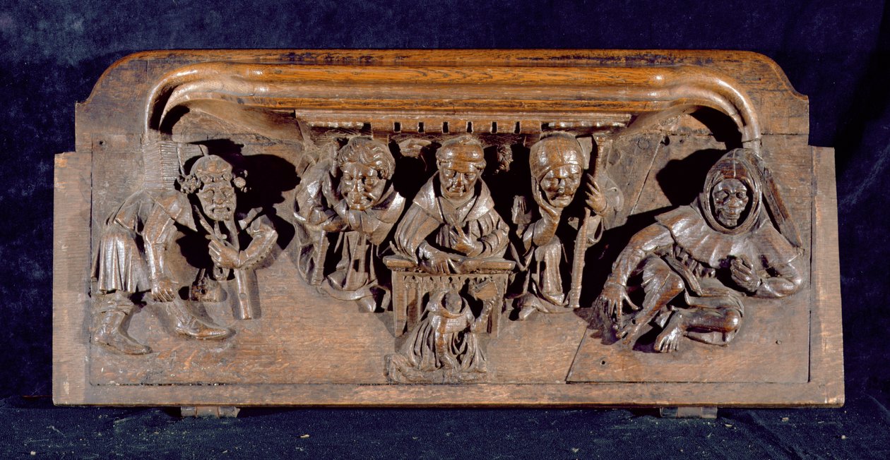 Une miséricorde représentant un académicien assis à un bureau délivrant une admonition à un pénitent agenouillé, New College Chapel, Oxford, fin du 14ème siècle - English School