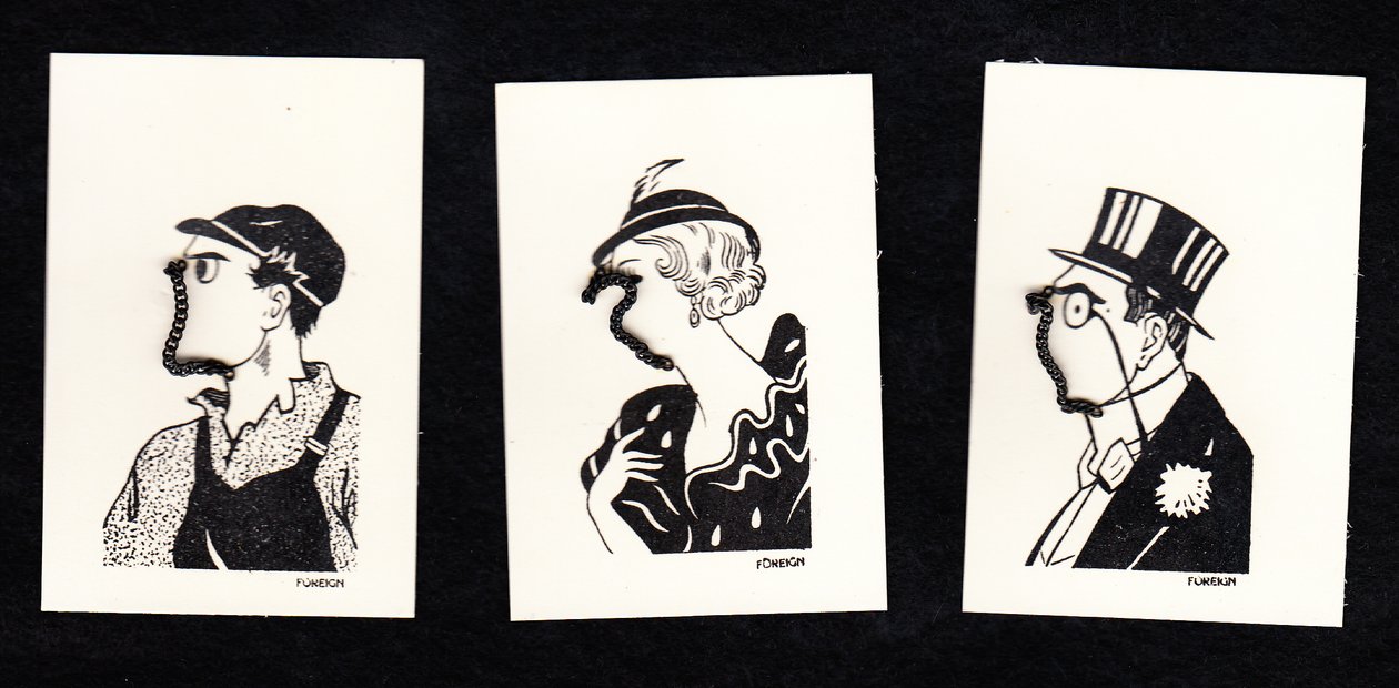 Jeu de trois cartes de visages de deux hommes et d