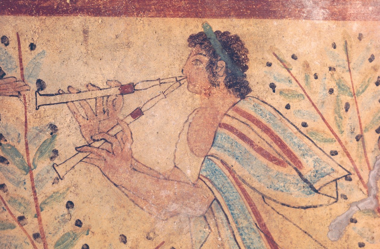 Art étrusque : un joueur de flûte. Détail d
