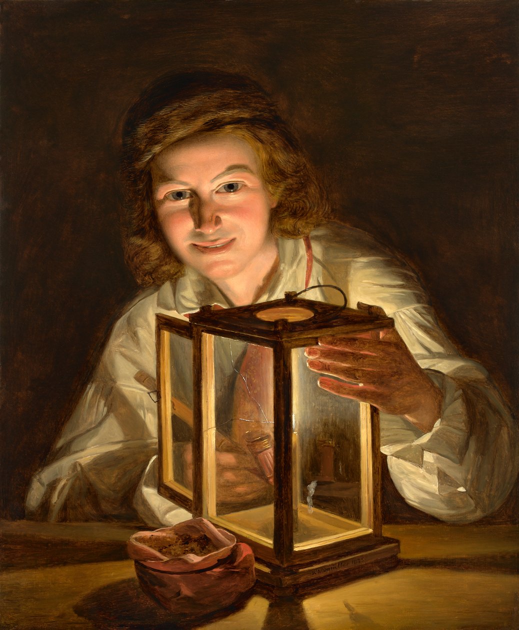 Garçon avec une lanterne d