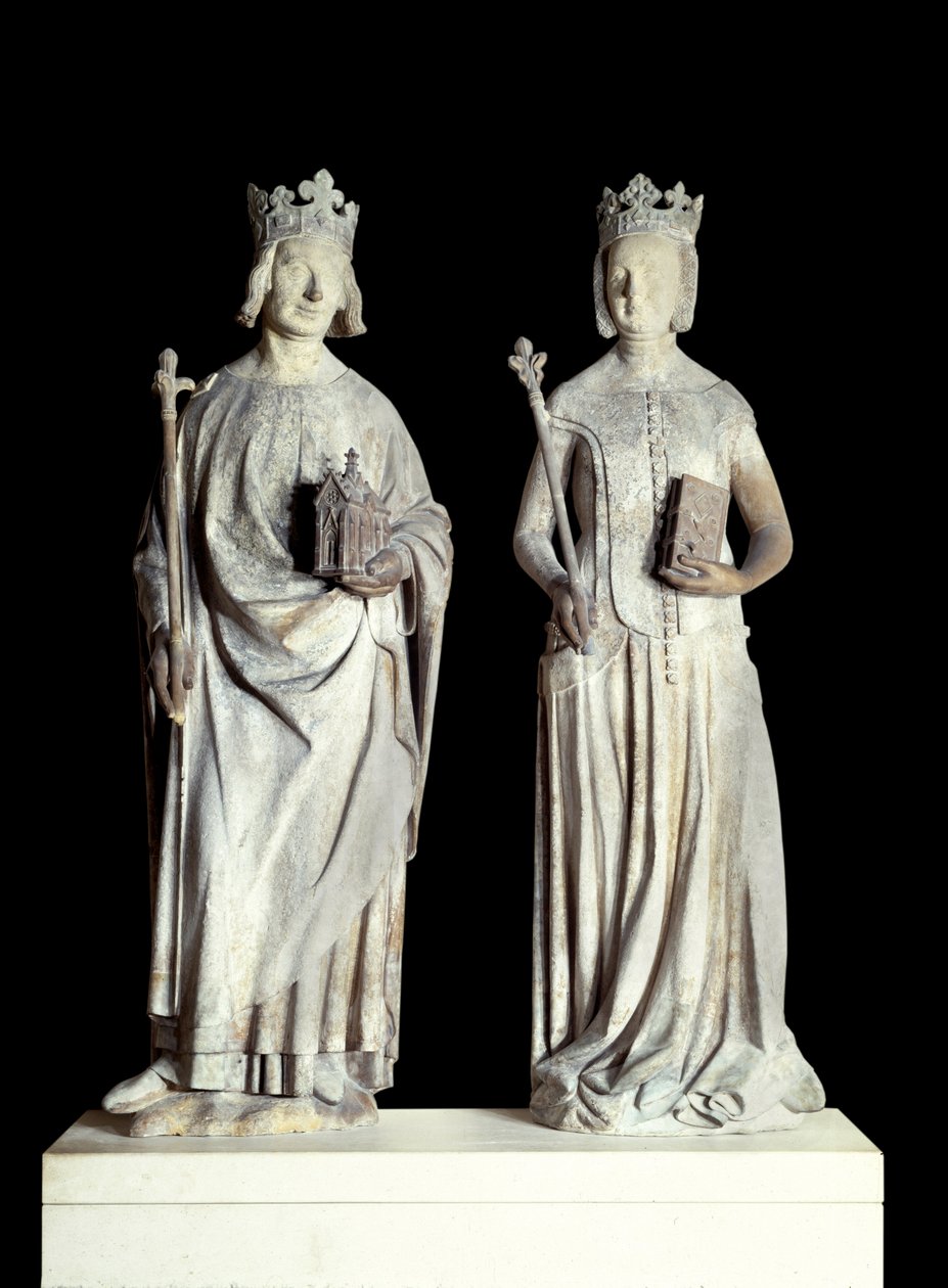 Art France : Statues du roi de France Charles V dit Charles le Sage (1338-1380) et de la reine de France Jeanne de Bourbon (1337-1378). Sculpture en calcaire du XIVe siècle. Probablement de la façade de l