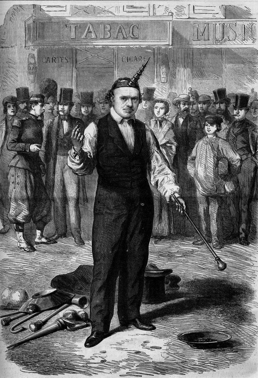 Artiste de rue : un bâtonniste (jongleur de cannes) dans les rues de Paris. - French School