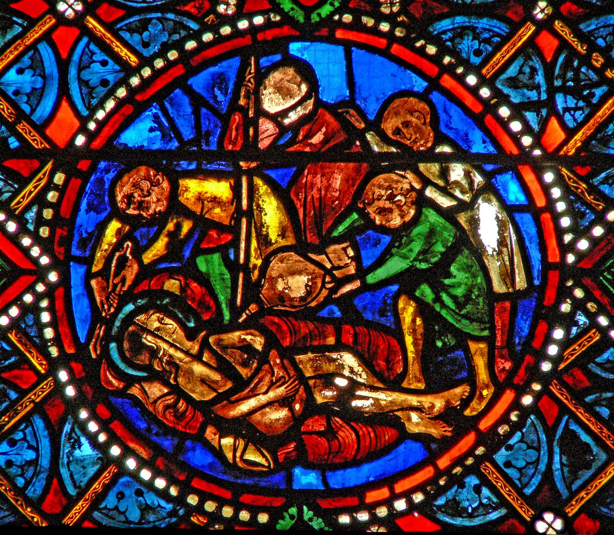 Fenêtre s4 représentant une scène de la vie de Sainte Agathe; la sainte rôtie vive - French School