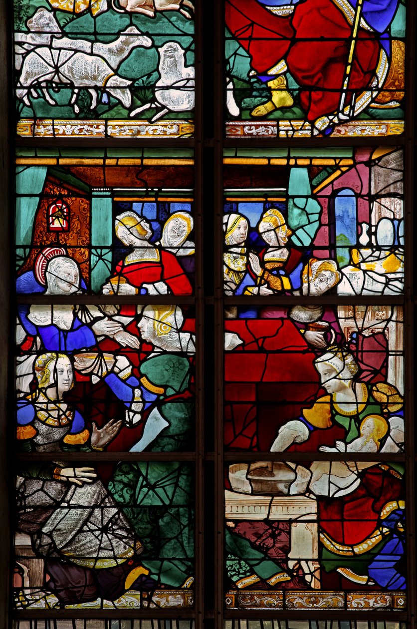 Fenêtre w2 représentant une scène de la Vie de la Vierge Marie : sa naissance avec de nombreuses personnes, sages-femmes, etc. - French School