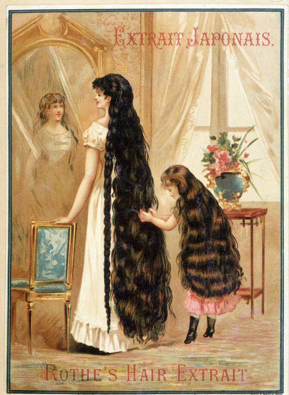 Jeune femme et sa petite fille avec des cheveux très longs et abondants - publicité pour l