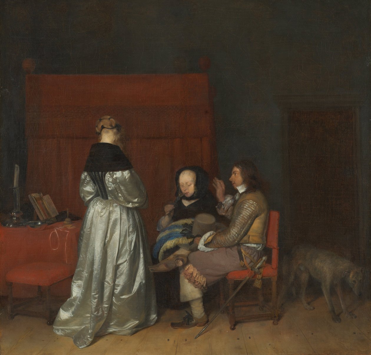 Trois figures conversant dans un intérieur L