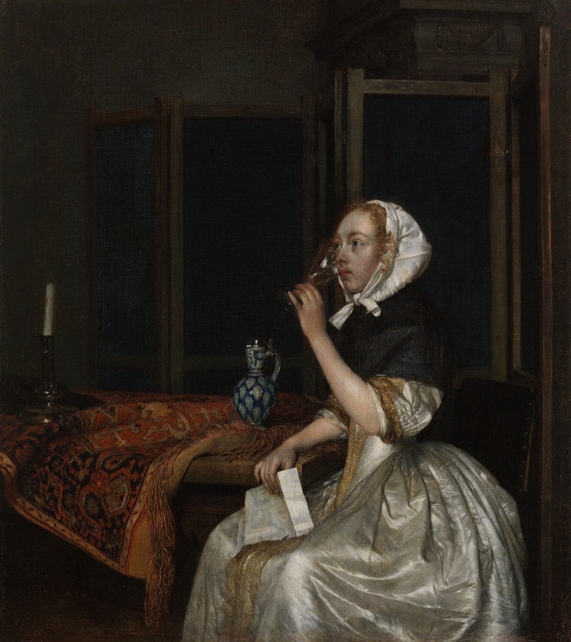 Jeune femme tenant un verre de vin et une lettre à la main - Gerard ter Borch