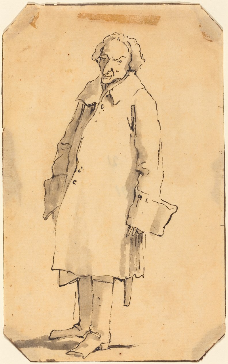 Un homme debout, vêtu d