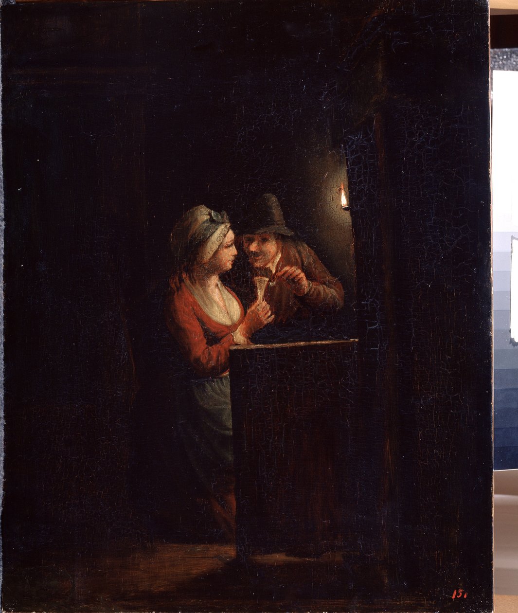 Un homme et une femme à la lueur d