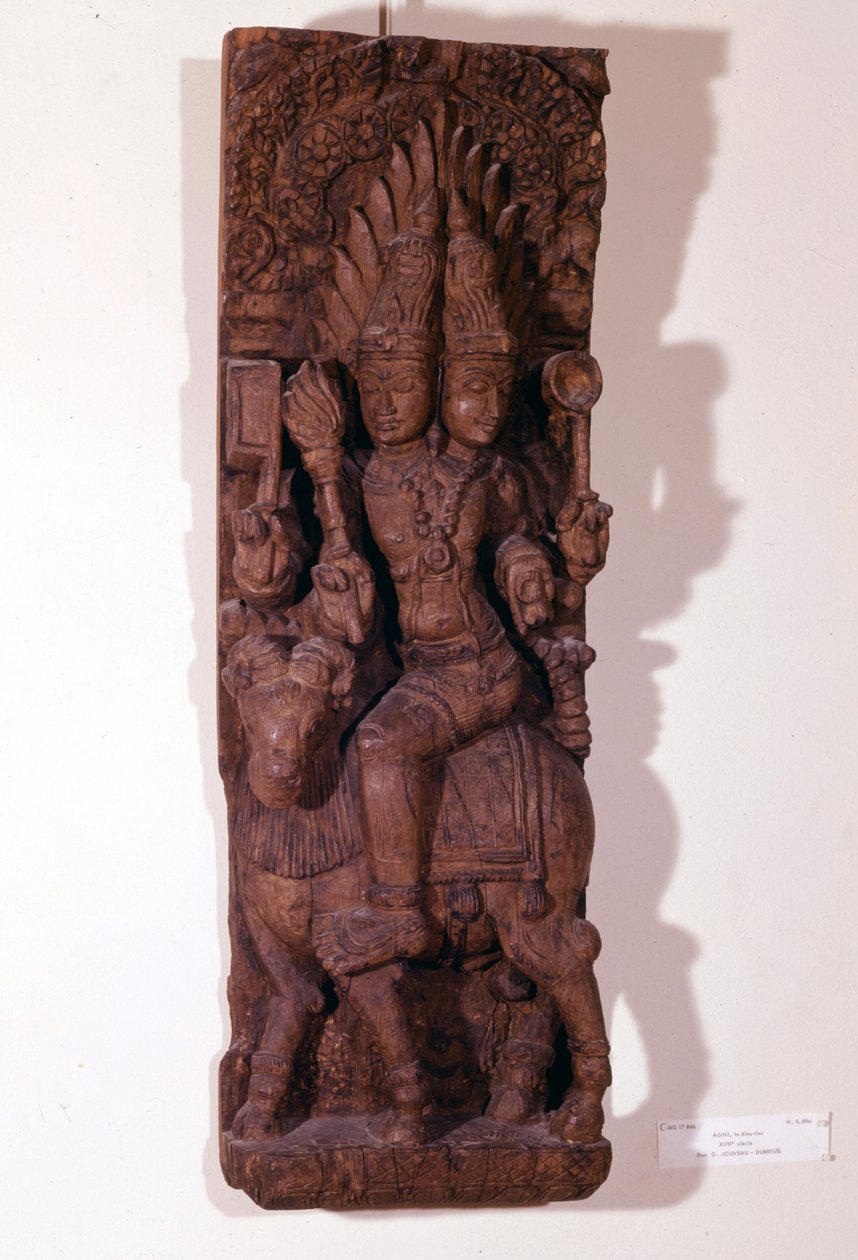 Agni, dieu du feu, représenté avec deux têtes (bicéphale) sur un bélier, selon la mythologie hindoue. Sculpture en bois du XVIIe siècle. Paris, Musée Guimet - Indian School