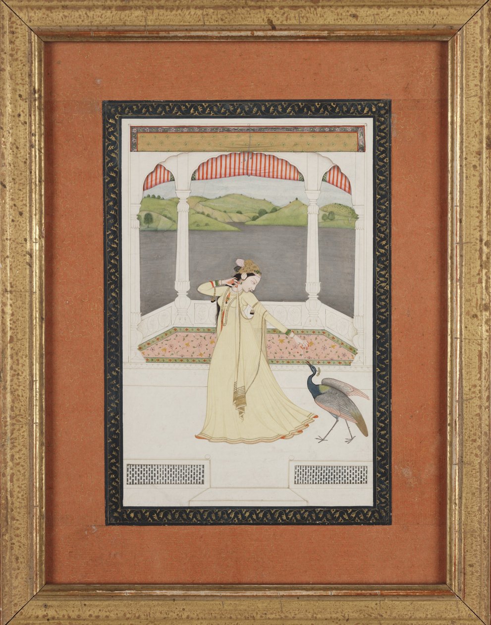 Dame attirant un paon avec un brin de perles - Indian School