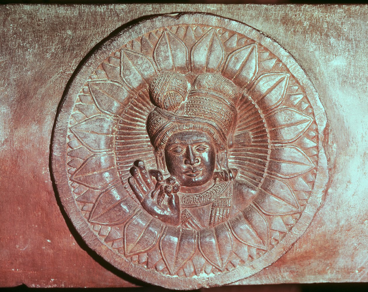 Relief représentant une fleur de lotus avec la tête d