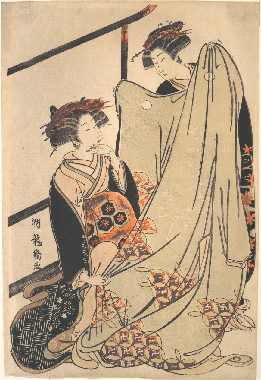 Deux beautés regardant un kimono - Isoda Koryusai