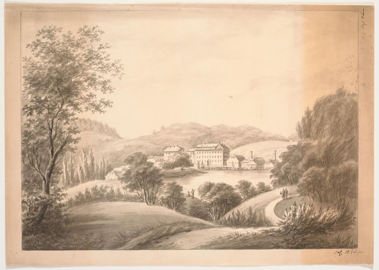 Plusieurs bâtiments adjacents, y compris un bâtiment principal et des maisons plus petites avec des cheminées, près d