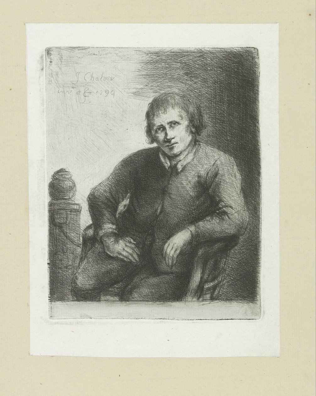 Homme assis à côté d