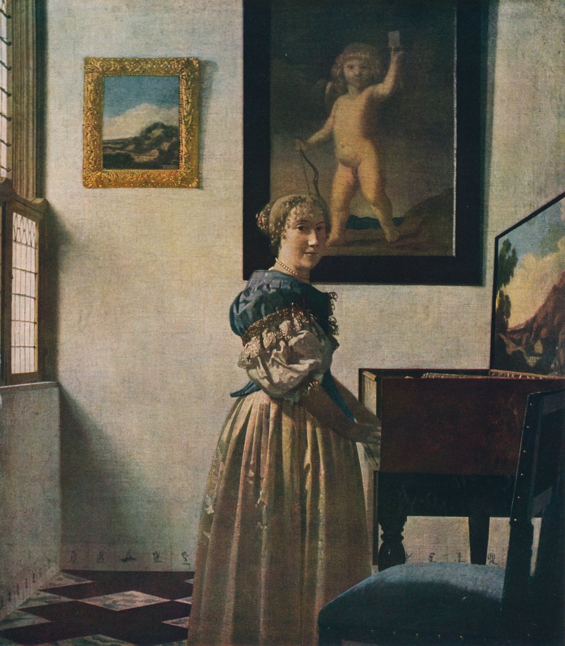 Une jeune femme debout à un virginal, vers 1670-1672 - Jan Vermeer van Delft