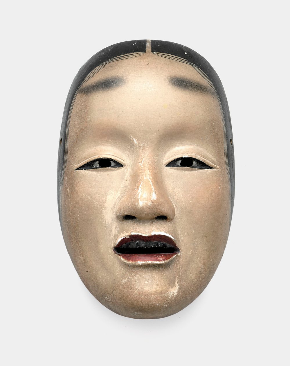 Un masque en bois avec fond gofun, peint avec sumi pour les cheveux, les yeux et les dents et rouge pour les lèvres - Japanese School