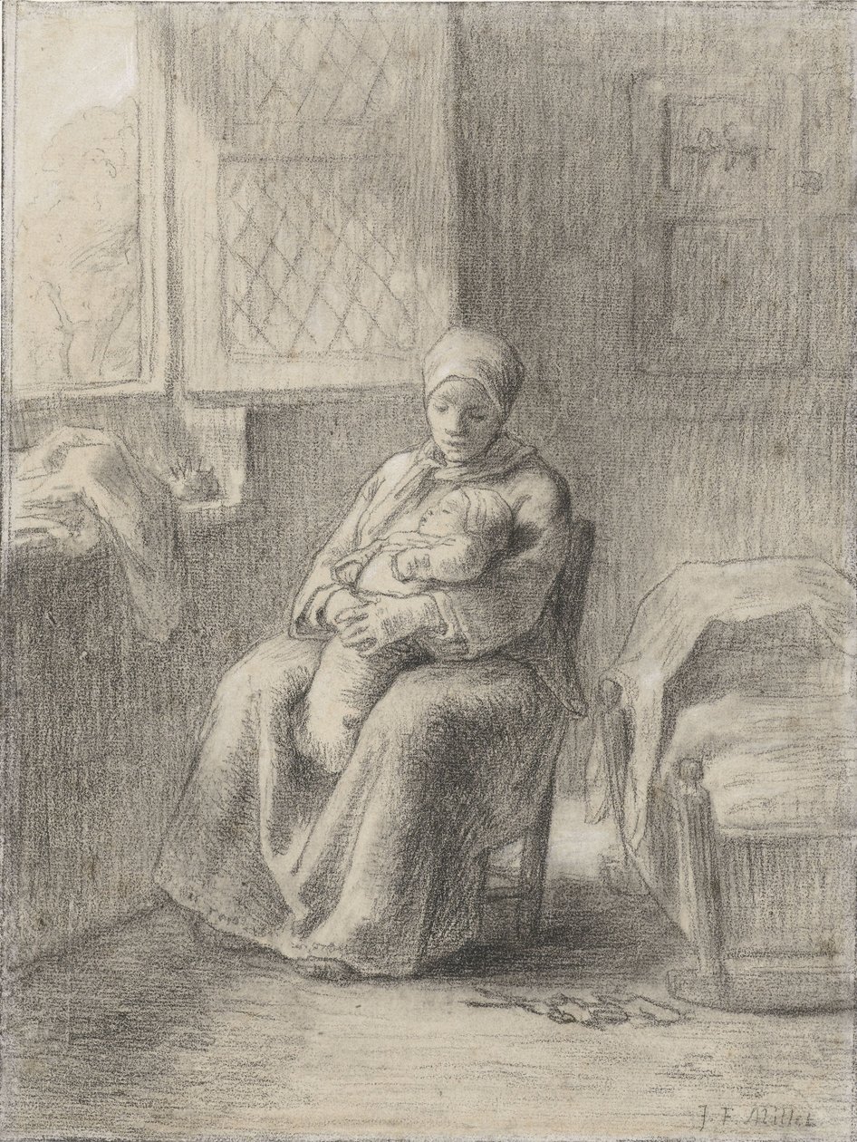 Femme assise avec un bébé près d
