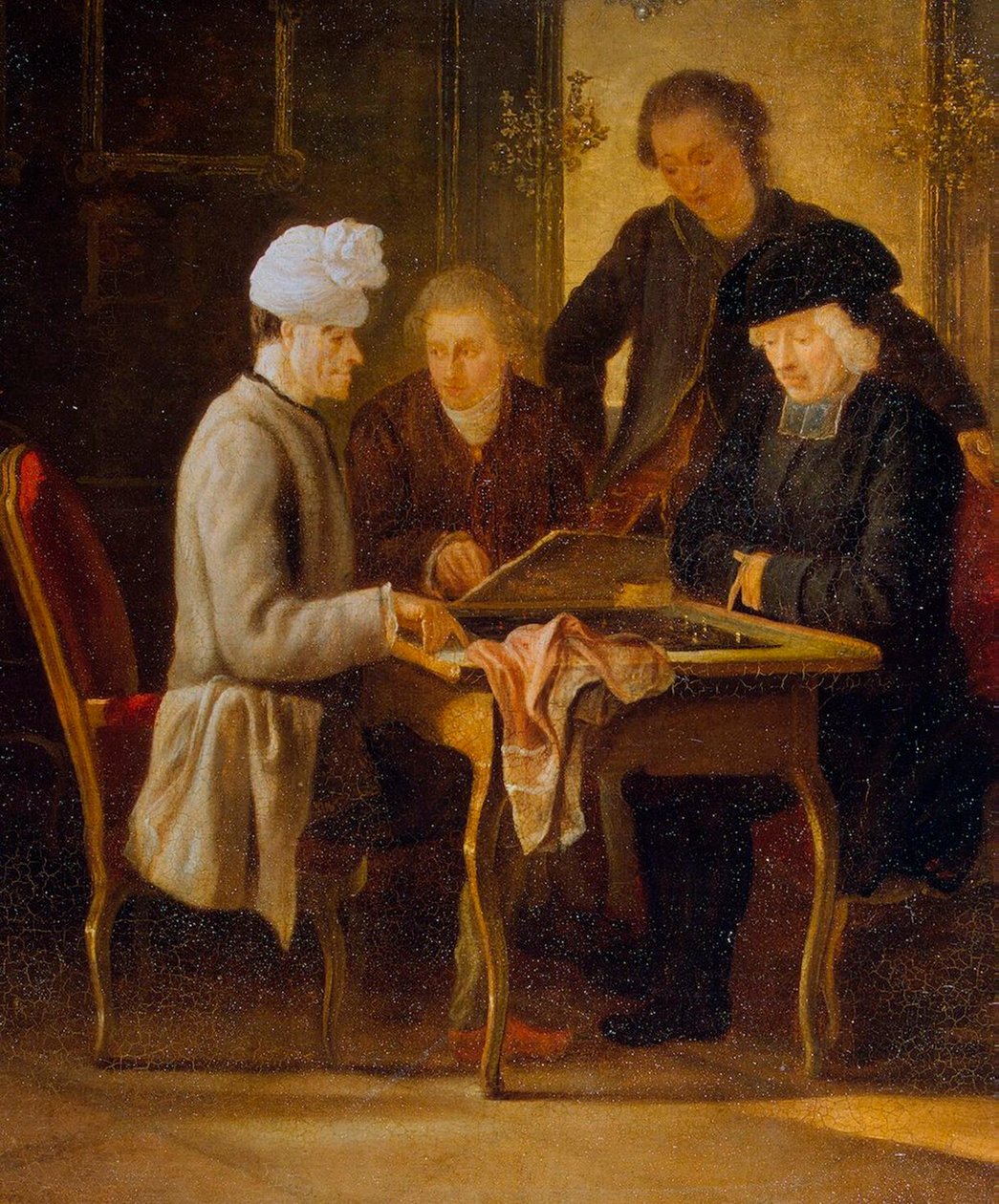 Voltaire à une table d
