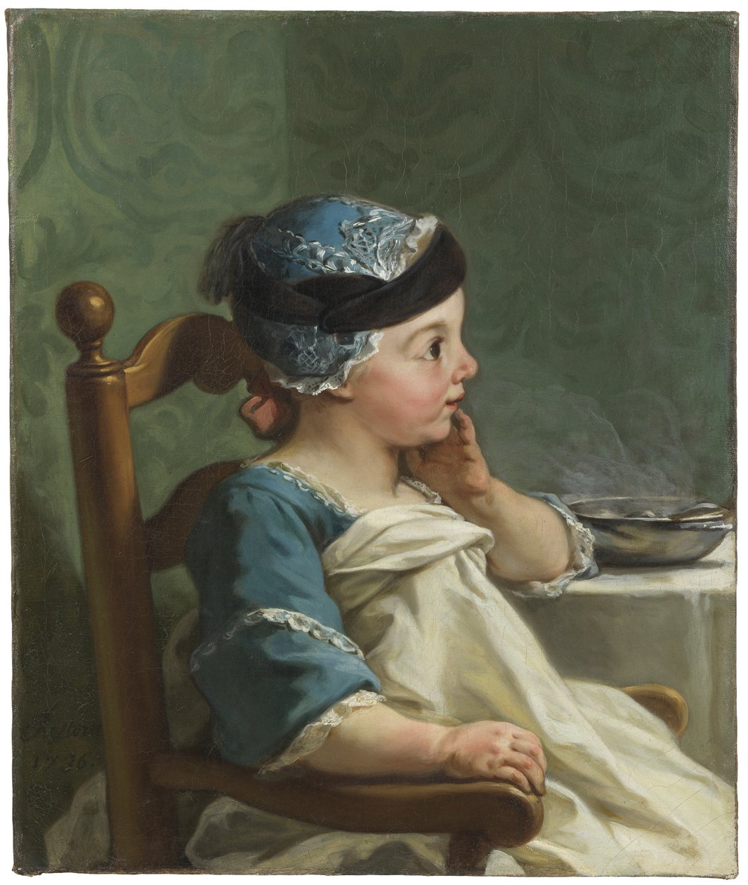 Garçon dans une chaise d