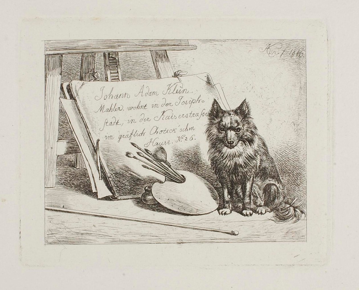 Chien assis près des outils de peintre et du portfolio, avec l