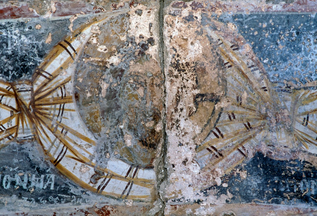 Visage du Christ, fresque endommagée dans l