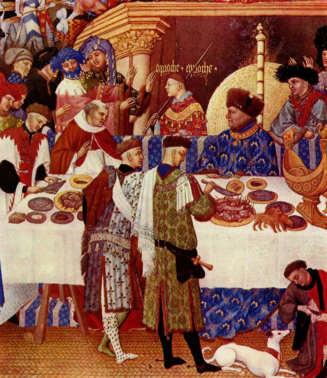 Le duc de Berry, assis en bas à droite, dos au feu, est habillé de bleu et coiffé d