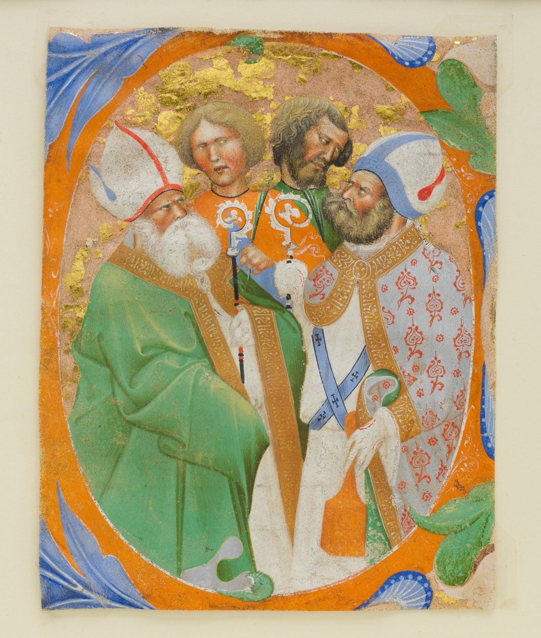 Enluminure de manuscrit avec quatre saints dans une initiale O, d