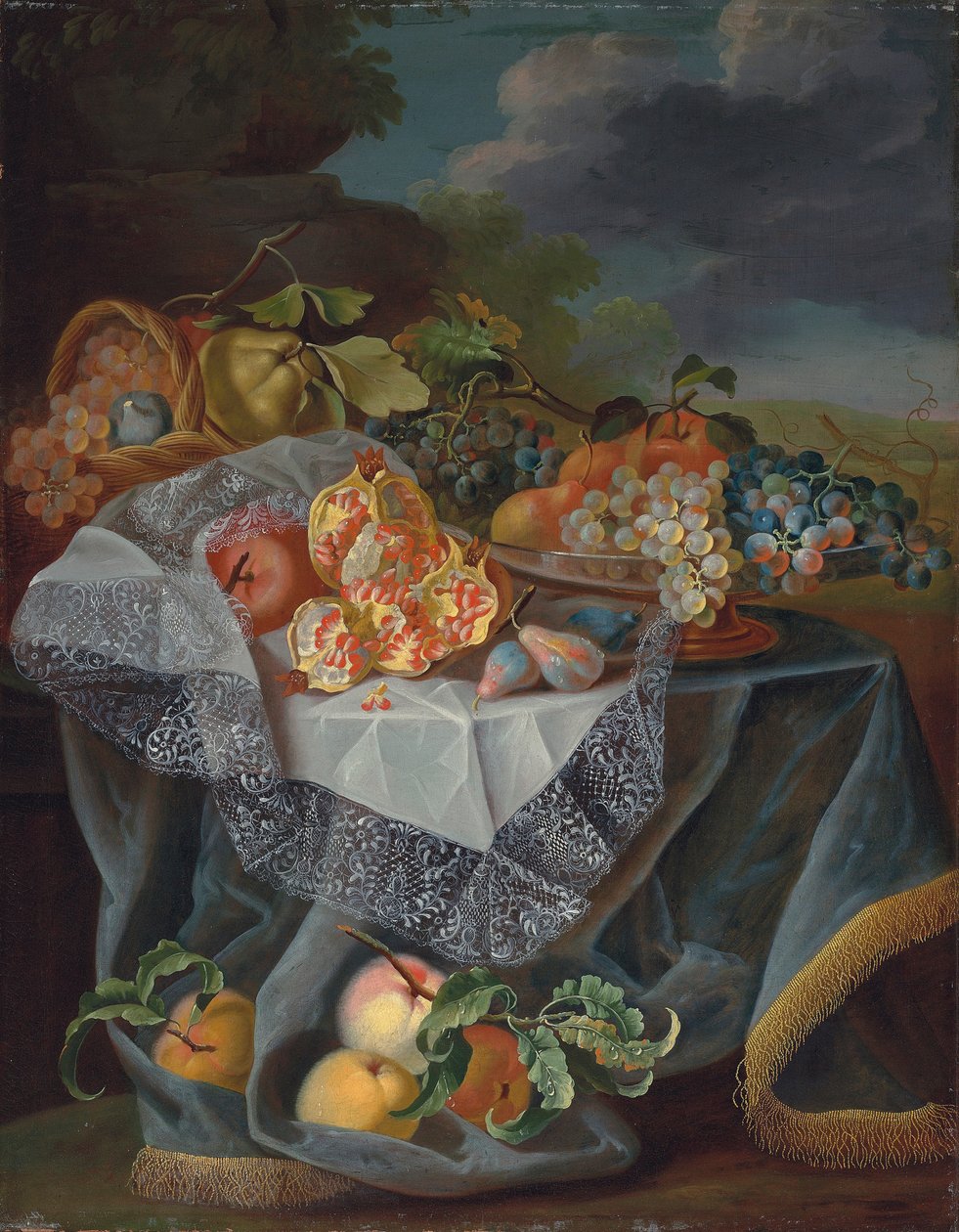 Raisins, poires et une pomme sur un récipient en verre, grenades et un panier tressé avec des fruits sur une table drapée, et un paysage de parc au-delà - Maximilian Pfeiler or Pfeiller