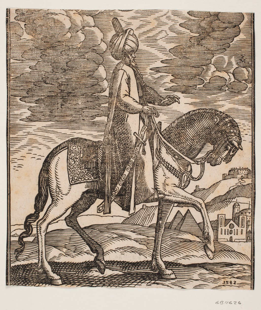 Cavalier en turban, avec une épée à son côté droit, profil vers la droite ; entre les pattes avant du cheval, deux pyramides apparaissent - Melchior Lorck