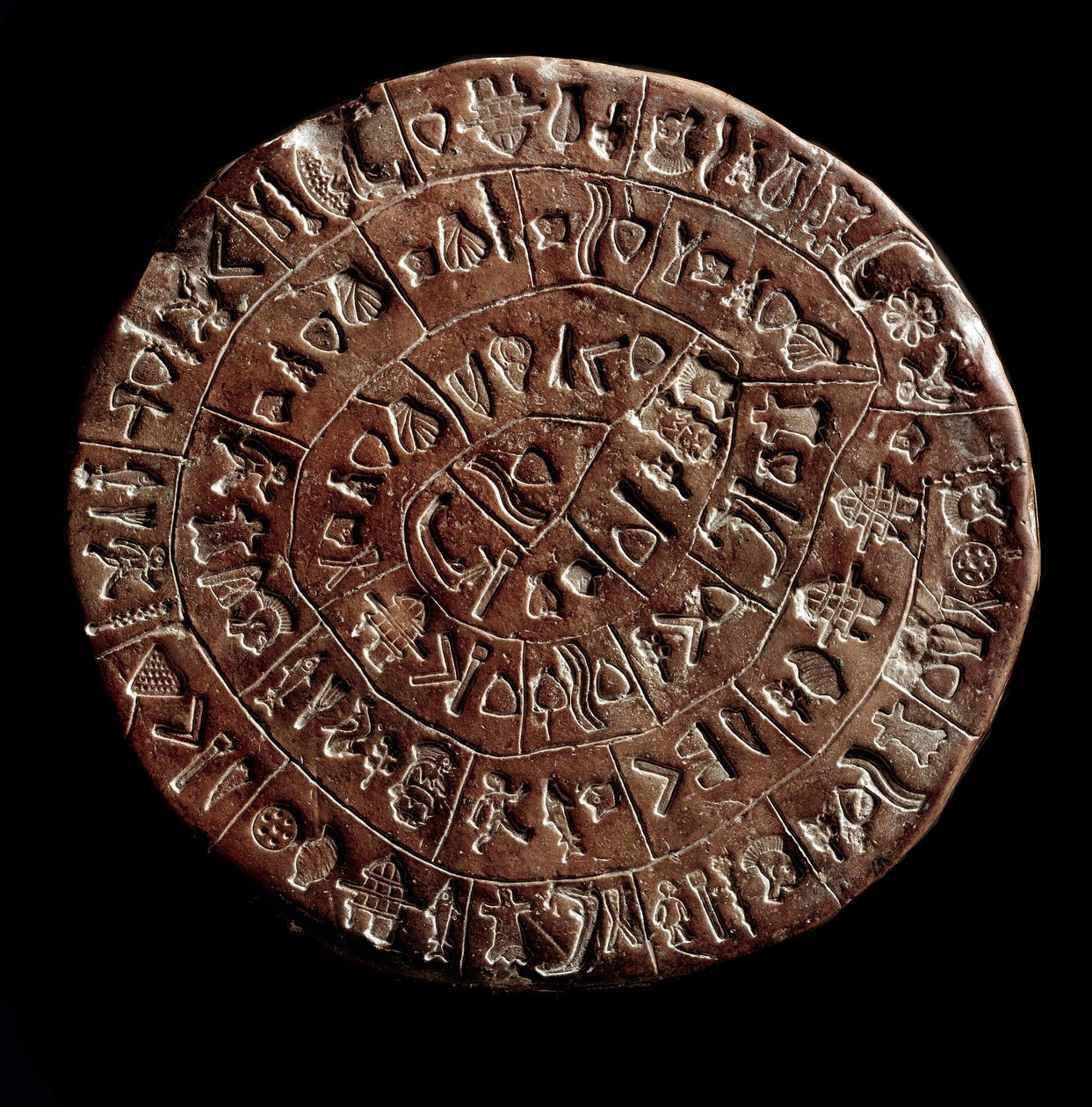 Le disque de Phaistos (Art minoen - 1700 - 1600 av. J.-C.) couvert de hiéroglyphes - Minoan