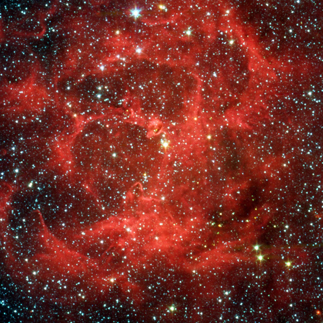 Comparaison des vues en lumière visible et infrarouge du télescope spatial Spitzer de la nébuleuse Trifide lumineuse, un nuage géant de gaz et de poussière formant des étoiles situé à 5 400 années-lumière dans le Sagittaire. Crédit NASA. - National Aeronautics and Space Administration National Aeronautics and Space Administration