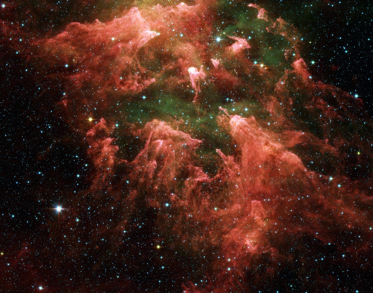 Image en fausses couleurs du télescope spatial Spitzer de la région du Pilier Sud de la nébuleuse de la Carène. Embryons d