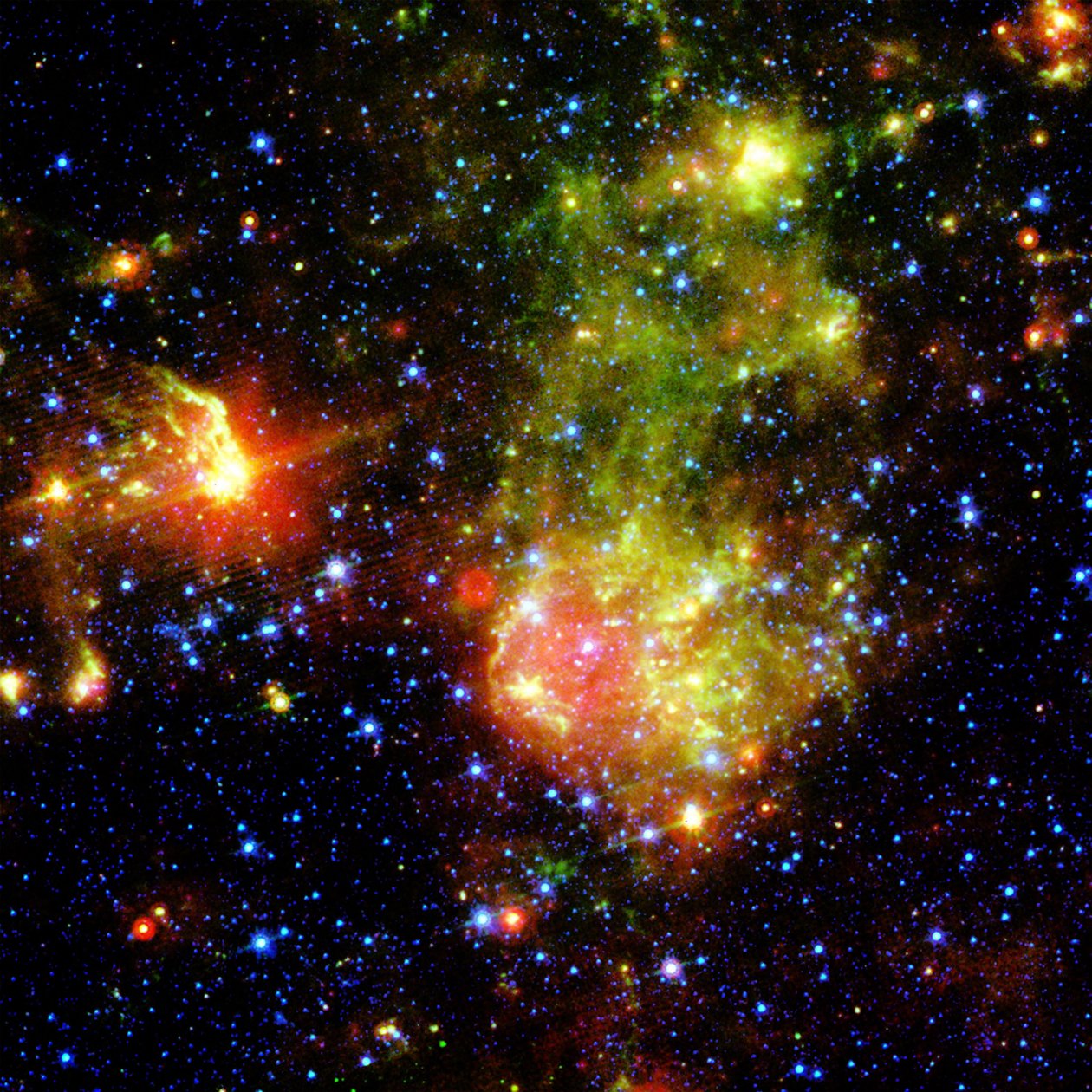 Reste de supernova 1E0102.2-7219 à côté de la nébuleuse N76 dans une région brillante de formation d