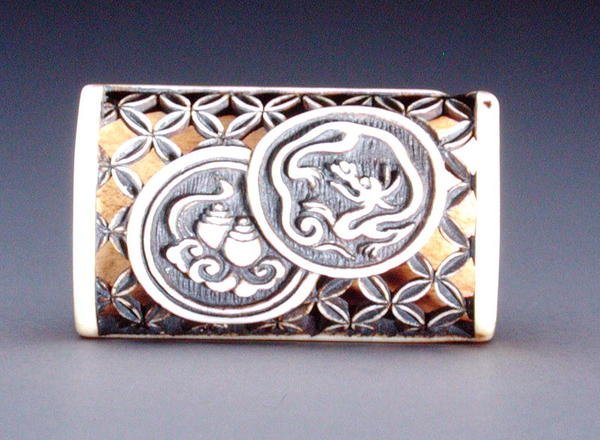 Netsuke avec design ajouré - Ozaki Kokusai