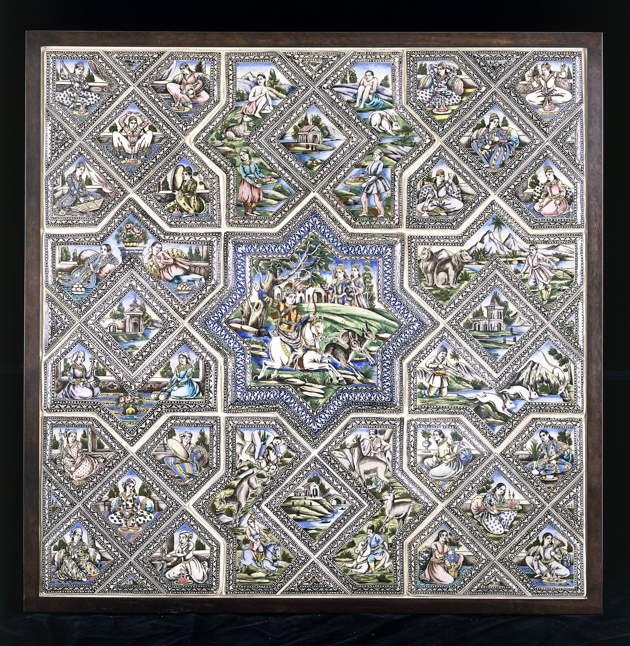 Un panneau de carreaux en poterie, représentant Bahram Gur chassant, et plusieurs autres figures dans une variété de scènes - Persian School