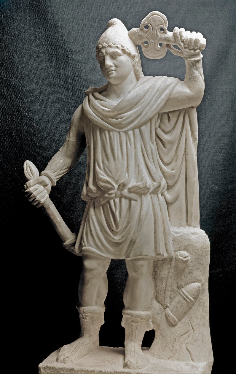 Civilisation des Phéniciens : divinité mithriaque tenant une torche et une double hache. IIe ou IIIe siècle apr. J.-C. Sculpture en marbre. Dim. 87 cm. Paris, Musée du Louvre - Phoenician Phoenician
