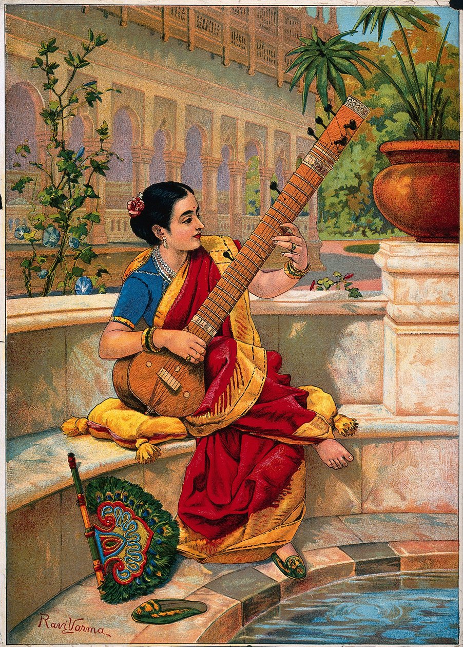 Une femme indienne assise joue du sitar près d