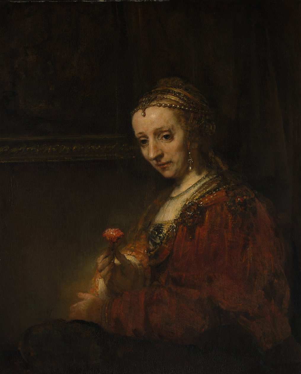 Femme avec un œillet - Rembrandt van Rijn