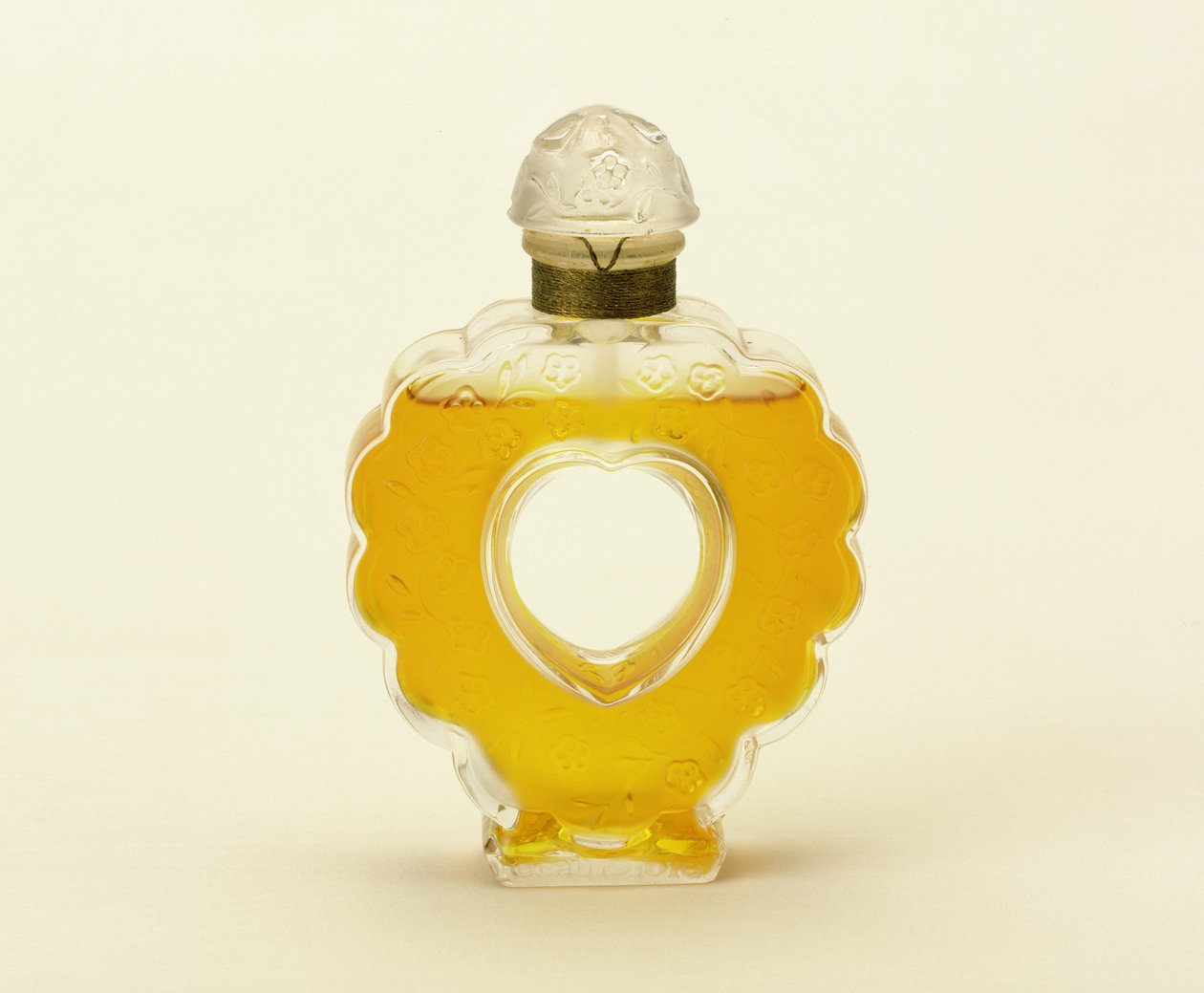 Coeur Joie, flacon de parfum clair givré par Lalique pour Nina Ricci - Rene Jules Lalique